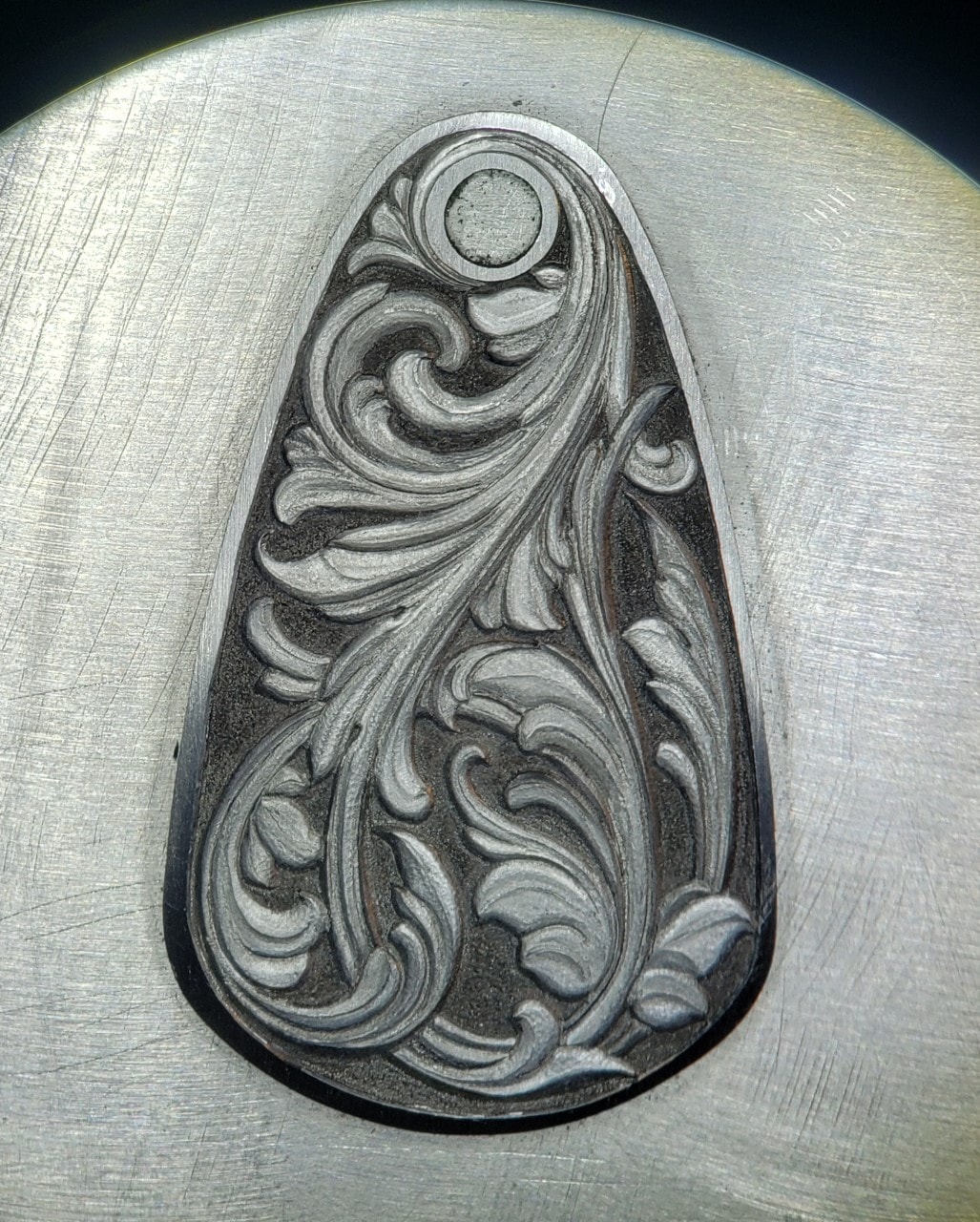 Steel Pendant — Deep Relief Scroll